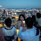 People watch the full moon on the observation deck of Roppongi Hills
Mori Tower, during a harvest-moon viewing event in Tokyo on September
10, 2022.